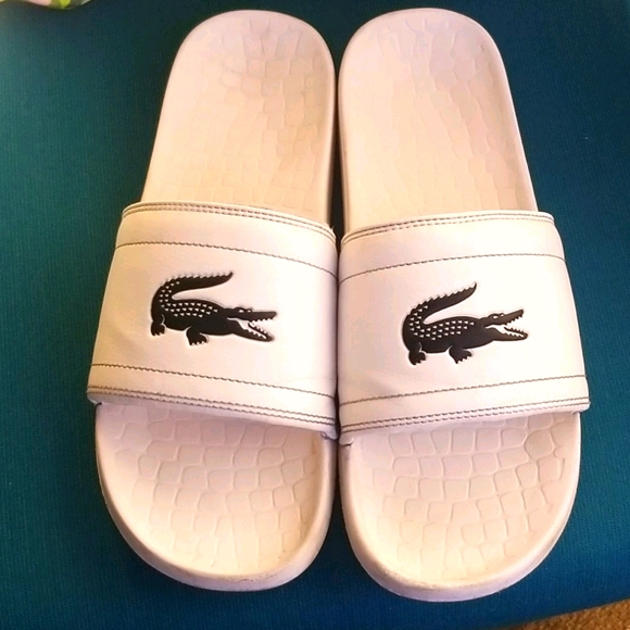 white lacoste slides